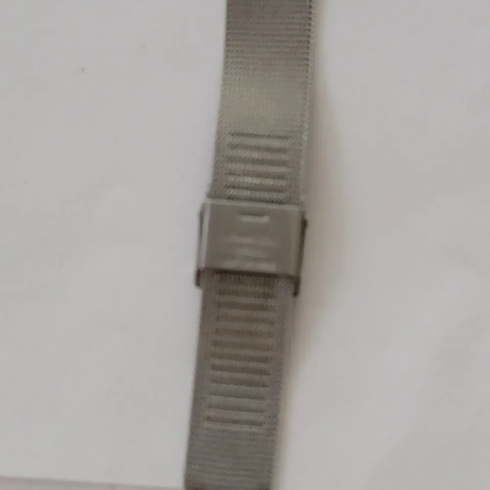 Skagen Womens Watch White Dial Silver Case Gold Bezel Mesh Bracelet Stainless